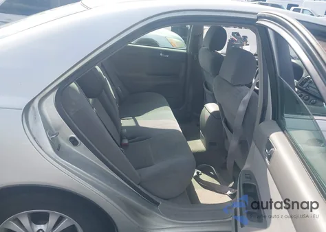 2005 Toyota Camry Le V6 z USA, uszkodzony, nr VIN 4T1BF32K75U106321